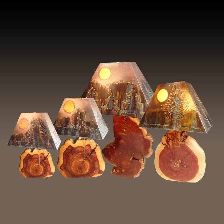 Multiple Red Cedar Lamps with copper shades. Ranging in size, mini, small, medium and large.